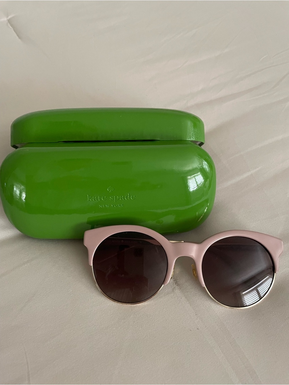 kate spade pale pink round sunglasses with dark lenses